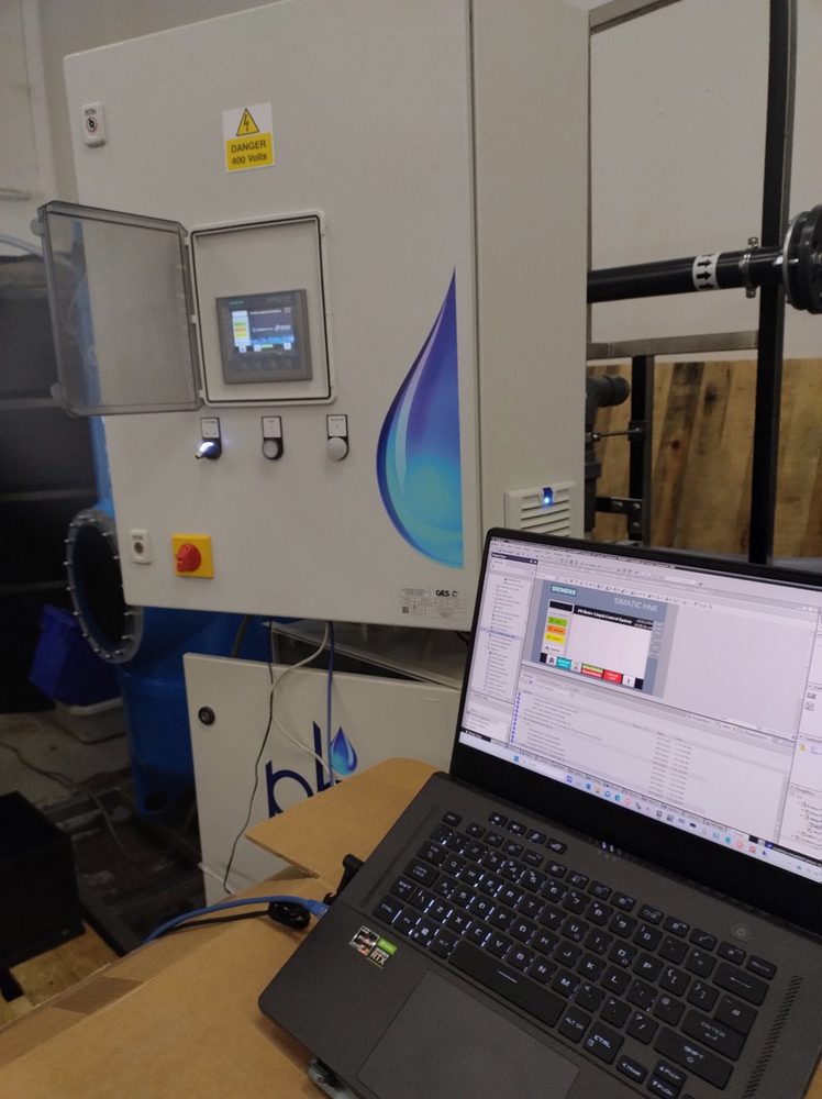 HMI commissioning laptop and water treatment panel